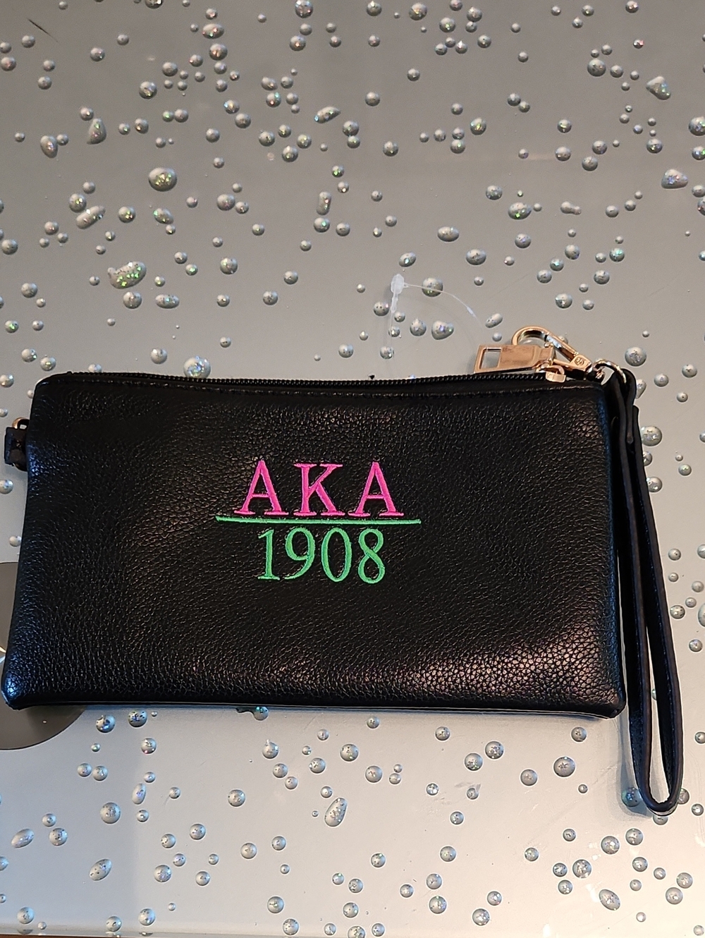 Black AKA 1908 Embroidered Wristlet Clutch
